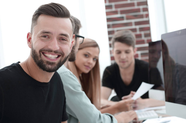 men is smiling during break, near modern office center. Young businessman lifestyle portrait. Technology and online communication concept - Foto, Imagem