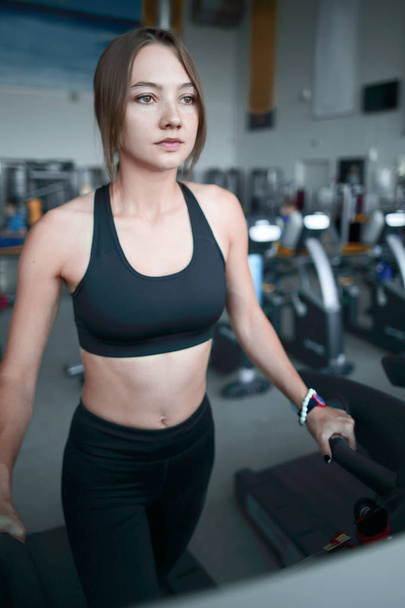 close up.modern young woman in the gym - Фото, зображення