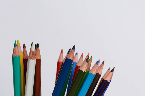 colored pencils on white background - Foto, imagen
