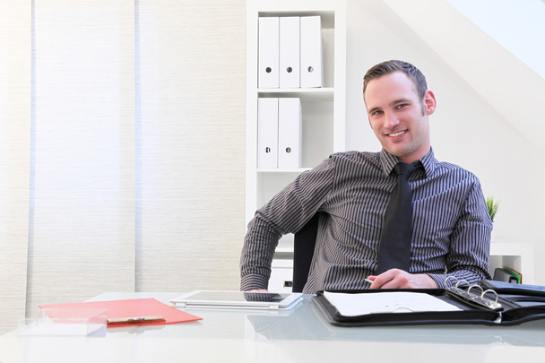 Smiling successful young businessman - Photo, image