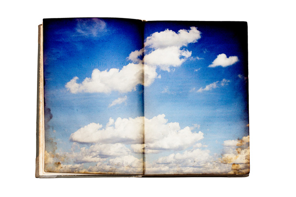 Old book with sky illustration - 写真・画像