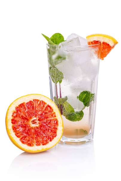 Cocktail of grapefruit and gin tonic on a white isolated background - Фото, зображення
