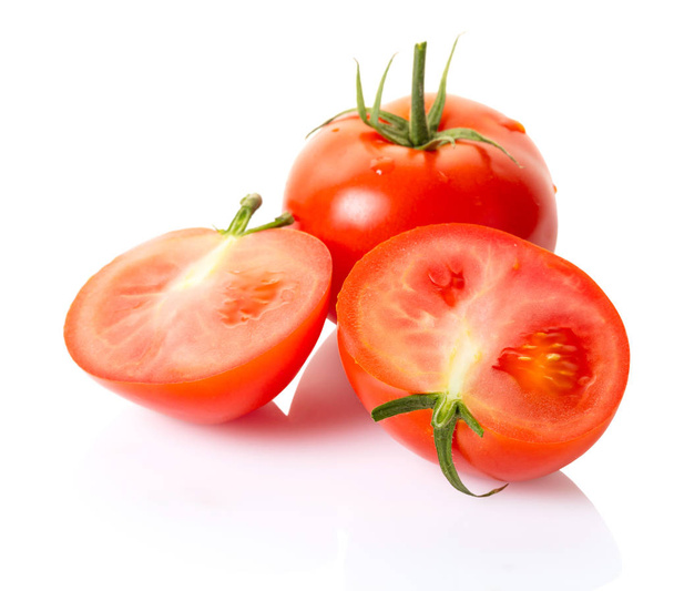 Ripe tomatoes with water drops on white isolated background - Photo, Image