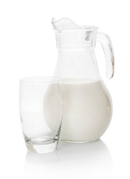 milk carafe and glass on white background - Foto, Imagen
