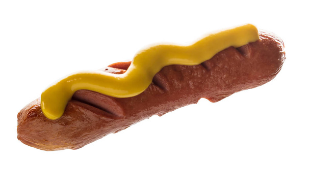 cooked sausage with mustard on a white background - Fotó, kép