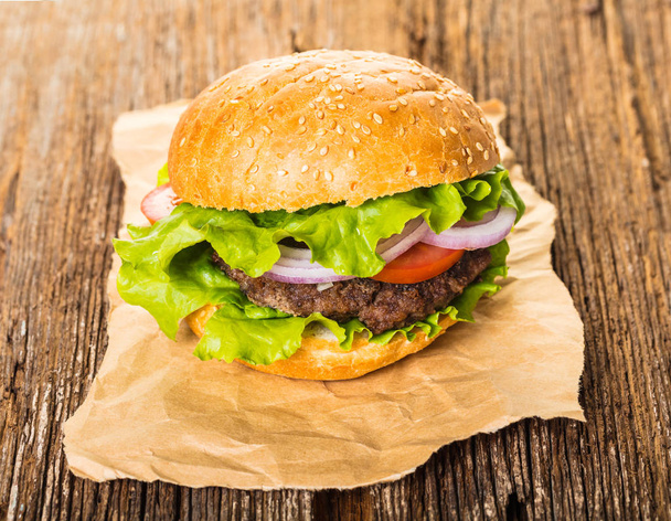 fast food, fresh burger on wooden background - Photo, Image