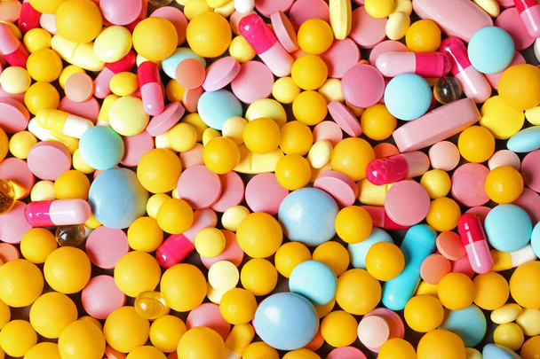 Heap of many different colorful pills as background - Zdjęcie, obraz