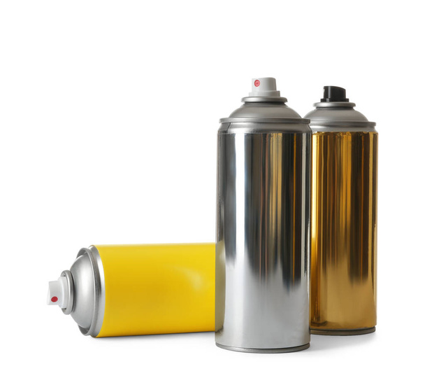 Cans of different spray paints on white background - Foto, imagen