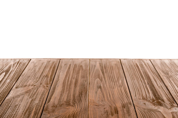 Empty wooden table surface on white background - Valokuva, kuva