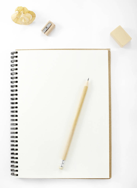Closeup of notepad with pencil, business background  - Photo, Image
