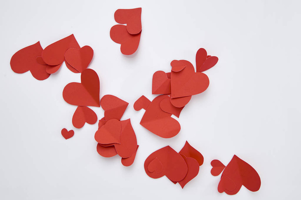 Beautiful paper red hearts on white background, close-up - Image - Photo, Image
