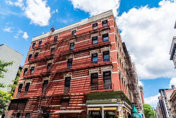 Low angle view of brick building in Soho in New York - Foto, imagen