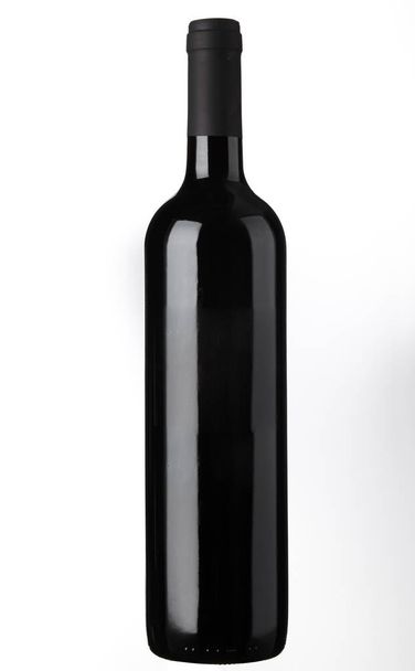 bottle of red wine with blank label isolated over white background - Photo, Image