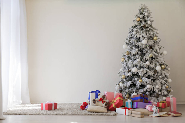 Christmas tree with presents, Garland lights new year - Φωτογραφία, εικόνα