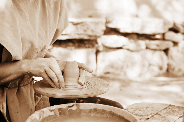 Making pottery (sepia toning) - Foto, afbeelding