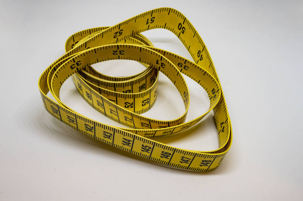 close up double sided yellow tape measure - Photo, Image