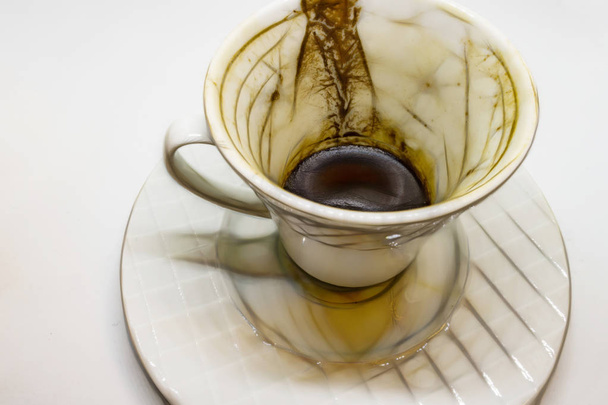 Traditional turkish coffee and coffee fortune in the cup - 写真・画像