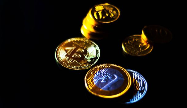 Crypto currency Gold Bitcoin with chocolate euro, BTC, macro shot of Bitcoin coins on black background, bitcoin mining concept - Zdjęcie, obraz