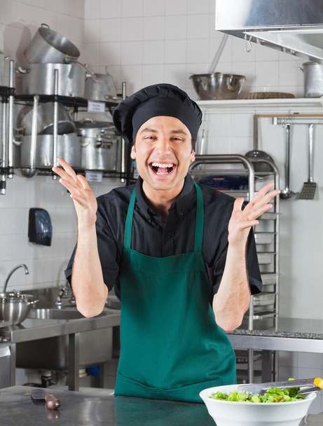 Male Chef Gesturing In Kitchen - Foto, immagini