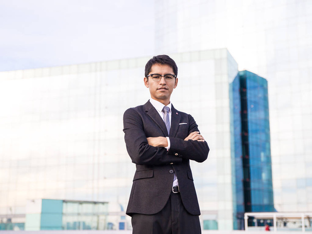 South american guy posing wearing a suit and glasses - Photo, Image