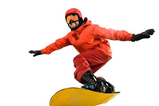 Portrait of young man in sportswear with snowboard isolated on a white background. - Fotografie, Obrázek