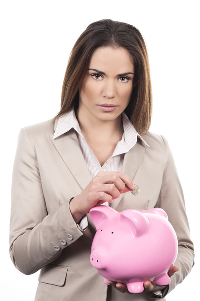 beautiful woman with piggy bank - Фото, изображение