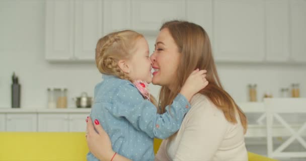 Excited mother and smiling daughter rubbing noses - Footage, Video