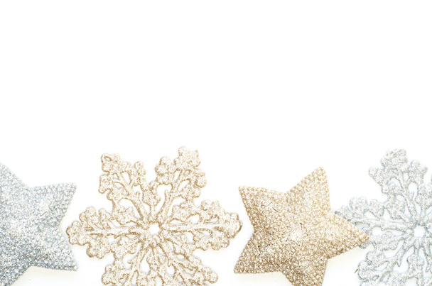 Christmas background with shining snowflakes and stars. - Foto, imagen