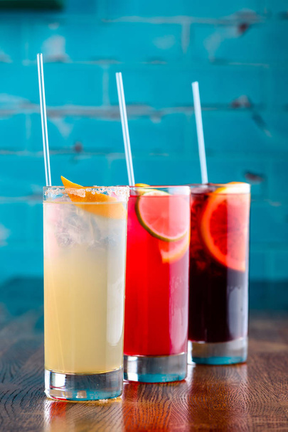 set of Classic alcoholic cocktails on bar counter in pup or restaurant with copy space - Photo, image