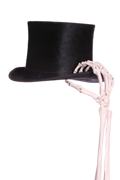 iskelet el ile eski bir şapka - Fotoğraf, Görsel