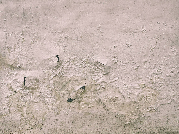 The wall of the old house. Cracks on the surface. Background - Foto, Bild