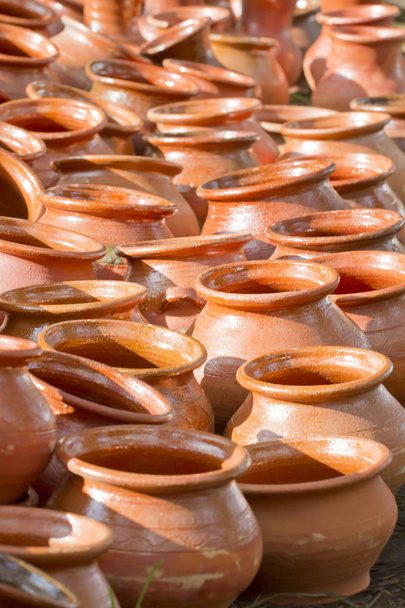 Background from a variety of clay pots. - Фото, изображение