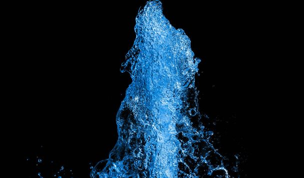 colored water splashes on black background  - 写真・画像