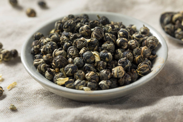 Dried Organic Jasmine Pearl Tea in a Bowl - Photo, image