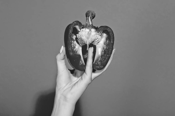 bell pepper in hand of woman hold sweet paprika, heart - Fotó, kép