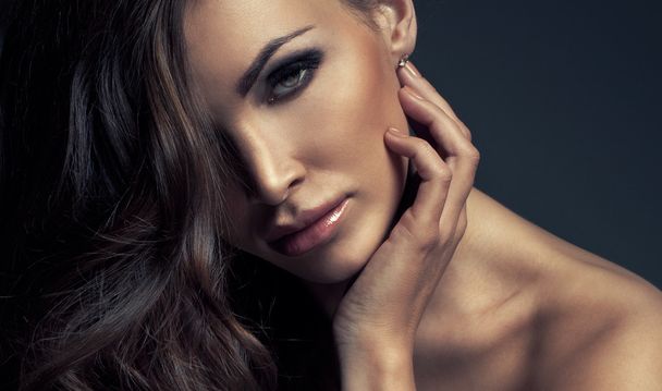 Portrait of perfect Makeup. Beautiful sexy woman with long Hair - Fotó, kép