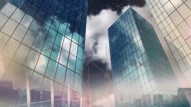low angle view of sky scrapers made of glass with cloudy dark sky - Záběry, video