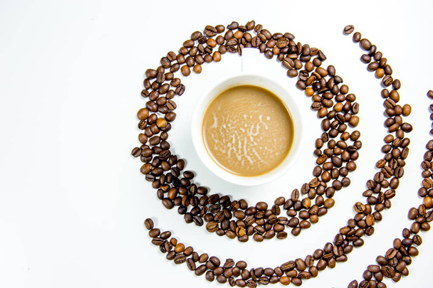 coffee beans composition on a white background - Fotó, kép