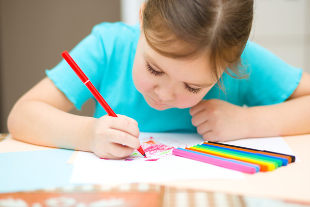 Cute cheerful child drawing using felt-tip pen - Photo, Image
