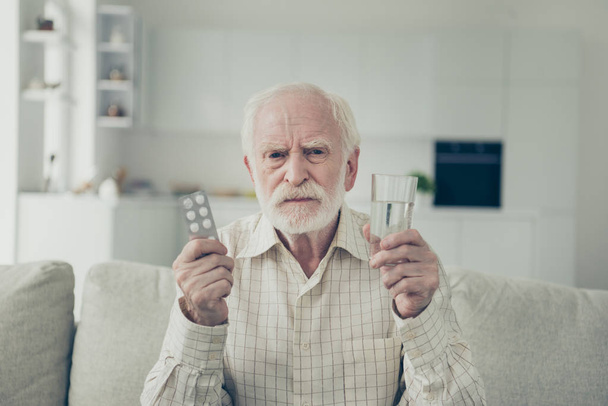 Portrait of nice sad tired stylish old man wearing checked shirt - Photo, Image