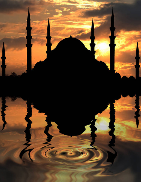 太陽が沈むとき、モスクのシルエット - 写真・画像