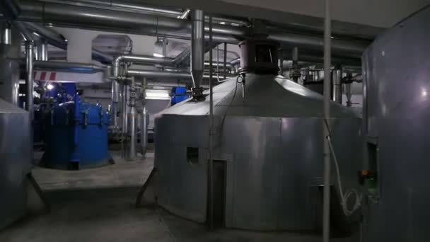 Stainless steel spherical cisterns for sunflower oil on up-to-date oil factory                                                                                   Exciting view of sunflower oil factory with many spherical steel tanks and machine tools - Footage, Video