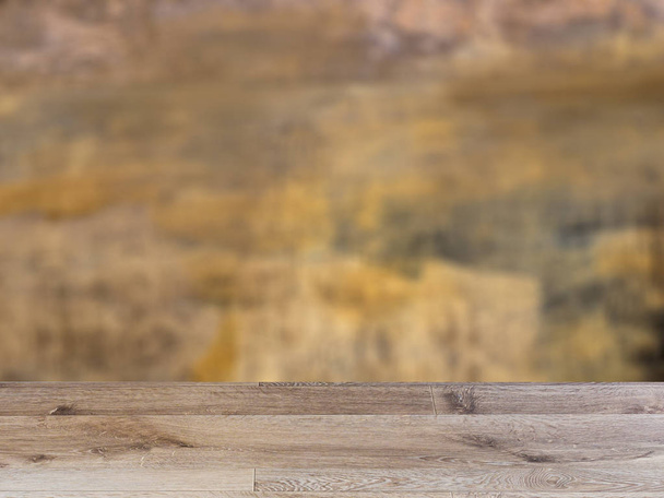 blank wooden table. Flooring. The wall of the old house. Cracks on the surface. Background - 写真・画像