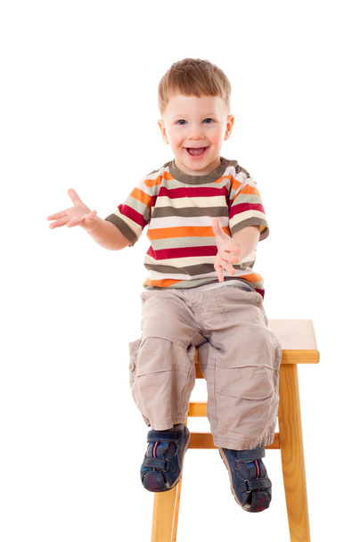 Little boy sitting on stool - Fotoğraf, Görsel