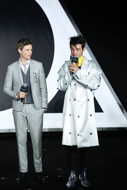 English actor Eddie Redmayne, left, and American actor and singer Ezra Miller attend a fan meeting event for the movie "Fantastic Beasts: The Crimes of Grindelwald" in Beijing, China, 28 October 2018. - Foto, immagini