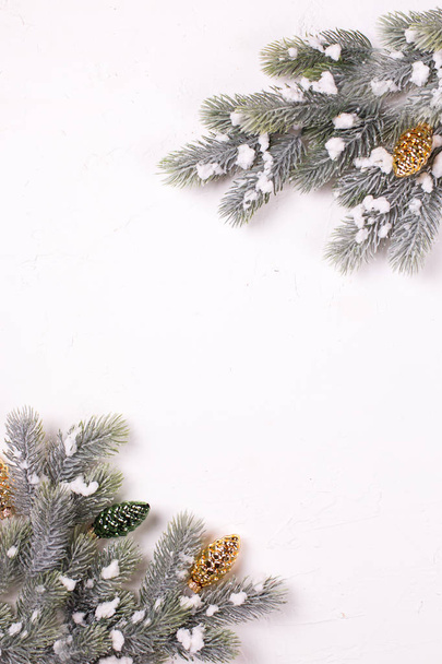 festive winter holidays composition with fir tree branches and christmas decorations - Foto, Bild