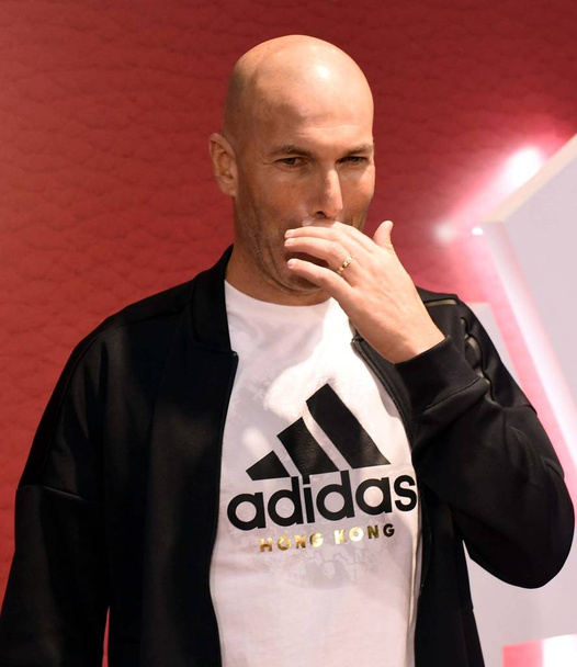 French football superstar and coach Zinedine Zidane attends a fan meeting event at a flagship store of Adidas in Hong Kong, 1 December 2018.  - Foto, Imagem