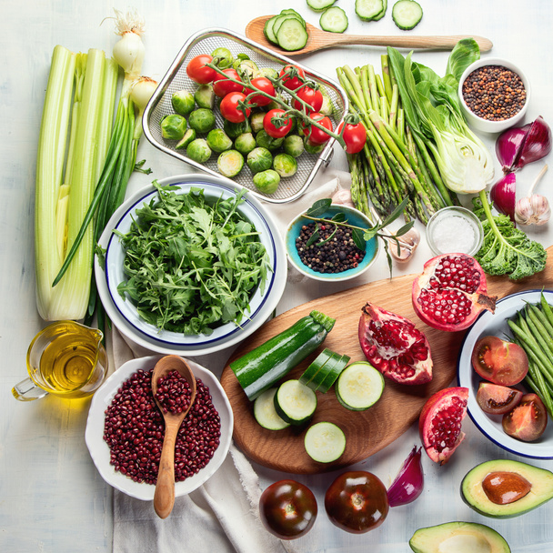 top view of Seasonal antioxidant vegan cooking ingredients on tabletop, healthy food concept - Photo, Image
