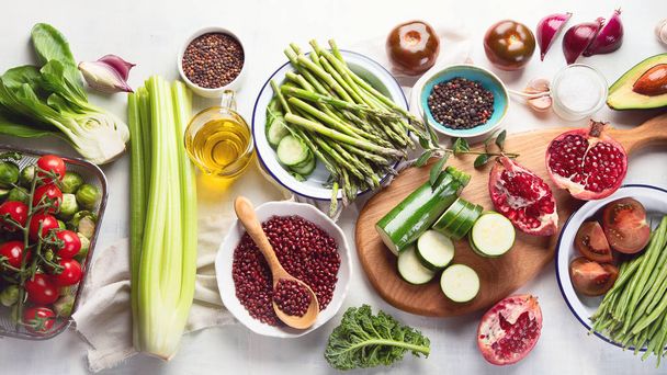 top view of yummy Seasonal vegan cooking ingredients on tabletop, healthy food concept - Photo, Image