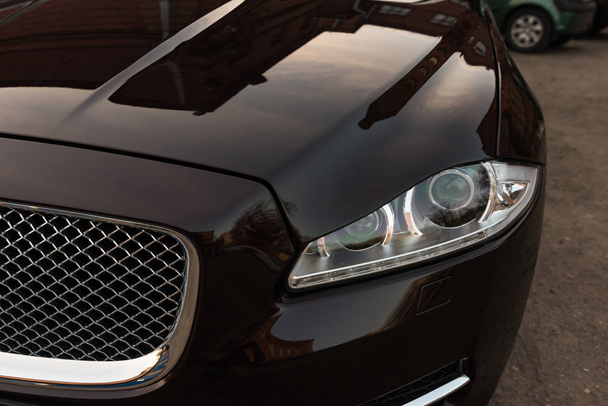 Modern luxury car headlights. Exterior detail. - Foto, Imagen